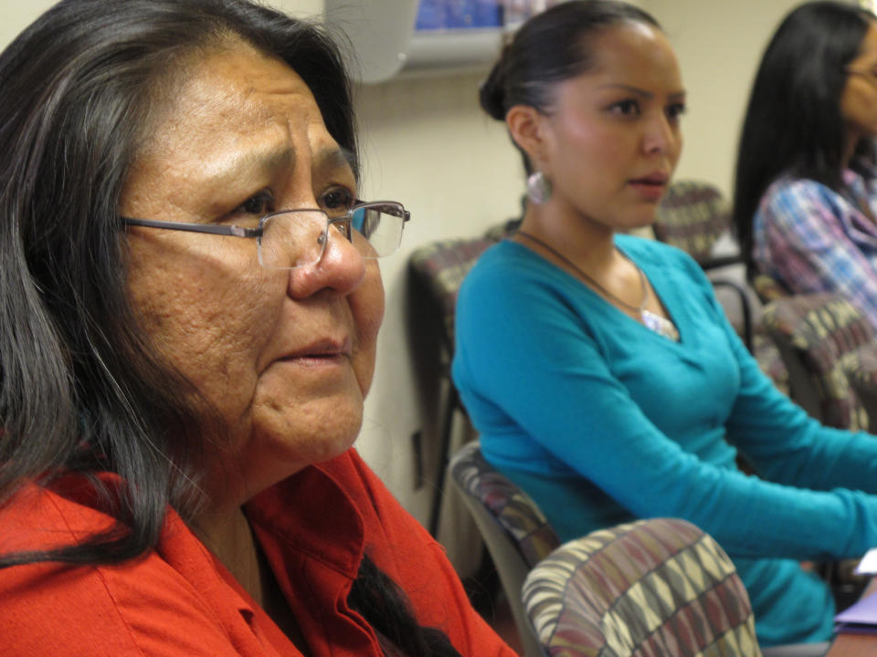 In this Oct. 19, 2012 photo, activist Donna House, 58, of Ohkay Owingeh Pueblo, left, participates in a forum on access for American Indian women getting emergency contraceptive Plan B, in Albuquerque. The federal Indian Health Services has said it is finalizing a policy to make Plan B available to American Indian women at its facilities much like it is in retail pharmacies across the country — without requiring a consultation with a health care provider and without a prescription, except for those under 17. (AP Photo/Russell Contreras)