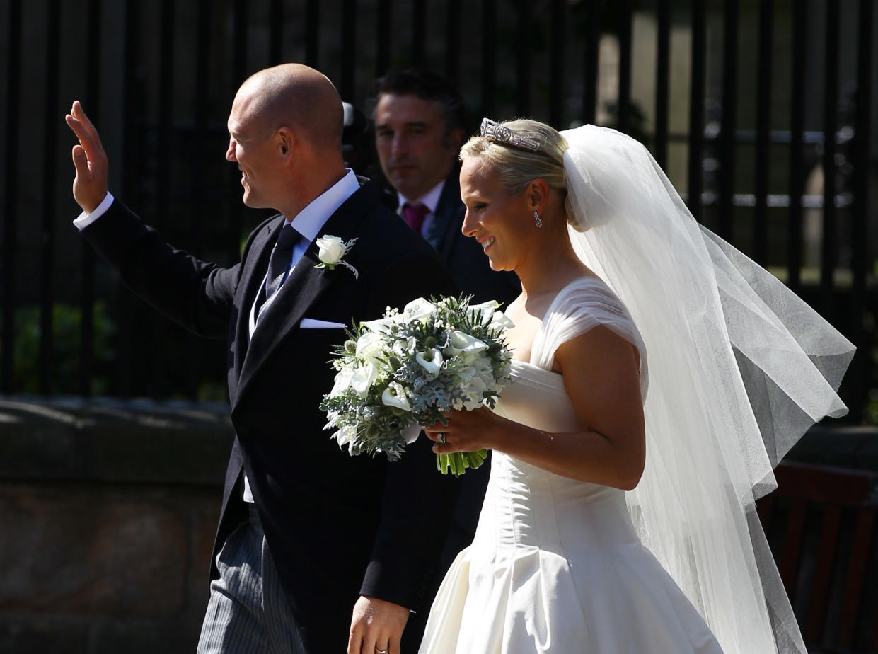 EDINBURGH, SCOTLAND - JULY 30:  Mike Tindall and Zara Phillips depart after their Royal wedding at Canongate Kirk on July 30, 2011 in Edinburgh, Scotland. The Queen's granddaughter Zara Phillips will marry England rugby player Mike Tindall today at Canongate Kirk. Many royals are expected to attend including the Duke and Duchess of Cambridge.  (Photo by Jeff J Mitchell/Getty Images)