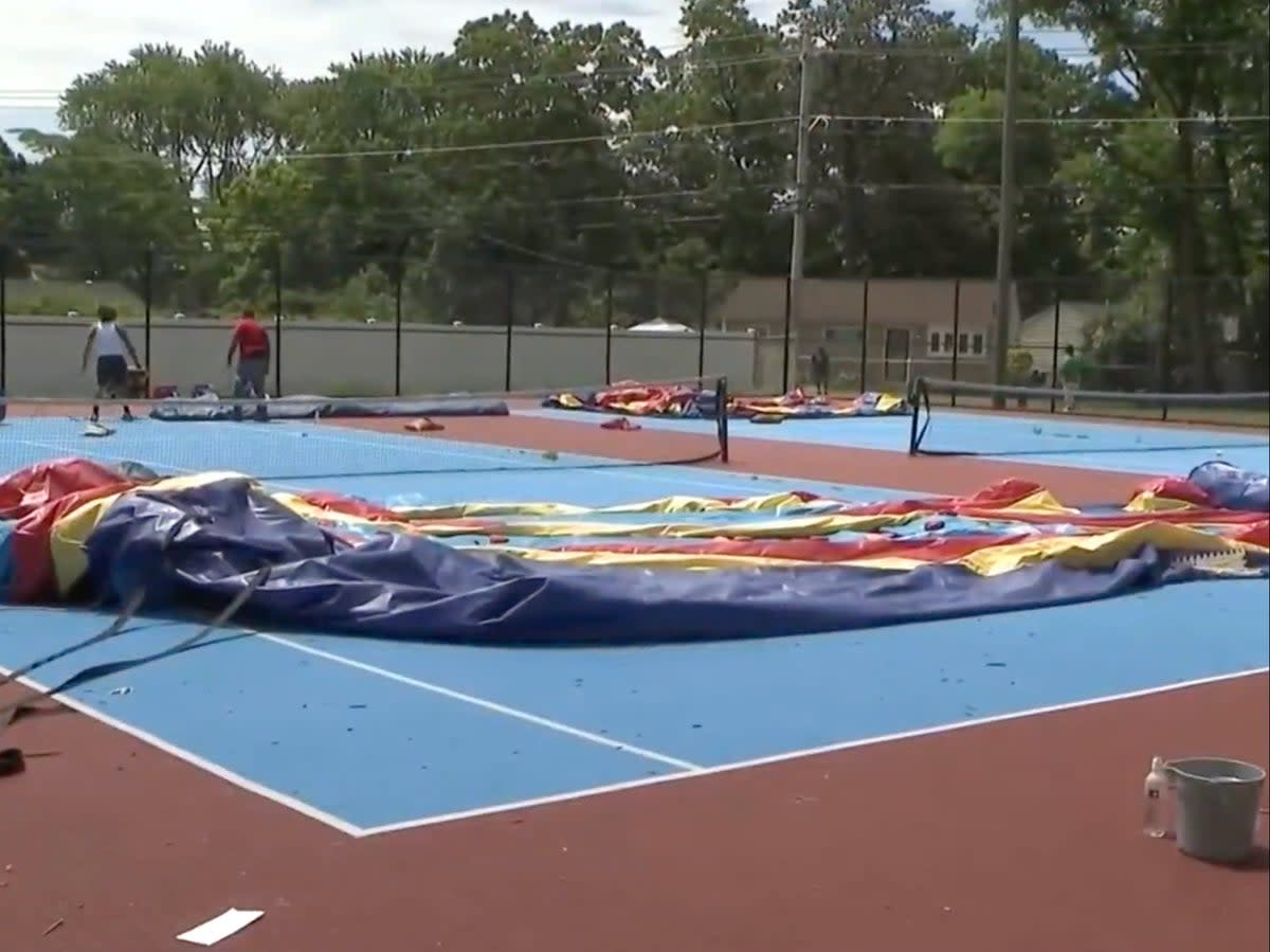 The inflatable slide collapsed during an end of school year event (CBS New York)