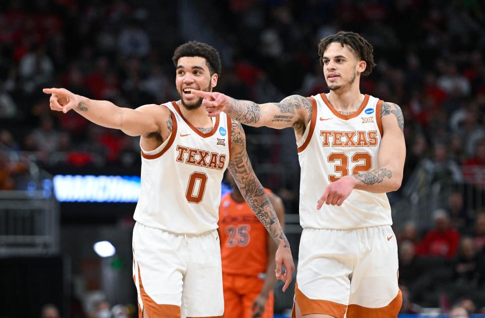 Texas forwards Timmy Allen and Christian Bishop react during  the second half of the first-round NCAA Tournament victory over Virginia Tech at Fiserv Forum in Miwaukee.