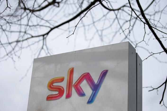 A Sky logo is pictured on a sign next to the entrance to pay-TV giant Sky Plc's headquarters in Isleworth, west London March 17, 2017. - A proposed multi-billion takeover bid for European pay-TV giant Sky by 21st Century Fox will be investigated by media watchdog Ofcom and the Competition and Markets Authority, the government said late on March 16.  Media magnate Rupert Murdoch's Fox announced in December that it had reached a formal agreement to buy its 61 percent stake.  in Sky that it does not already own.  (Photo by Daniel LEAL / AFP) (Photo by DANIEL LEAL / AFP via Getty Images)