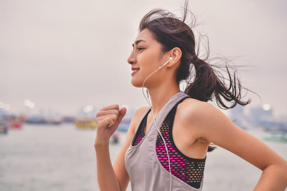 Music may make running a lot more fun. (Siriwat Nakha  / Getty Images)