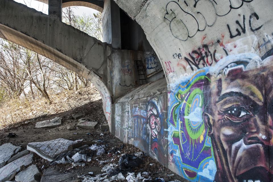 Abandoned homeless encampments dot the edges of the Merrimack River, which cuts through both Lawrence and Lowell.&nbsp; (Photo: Erin Schumaker/HuffPost)