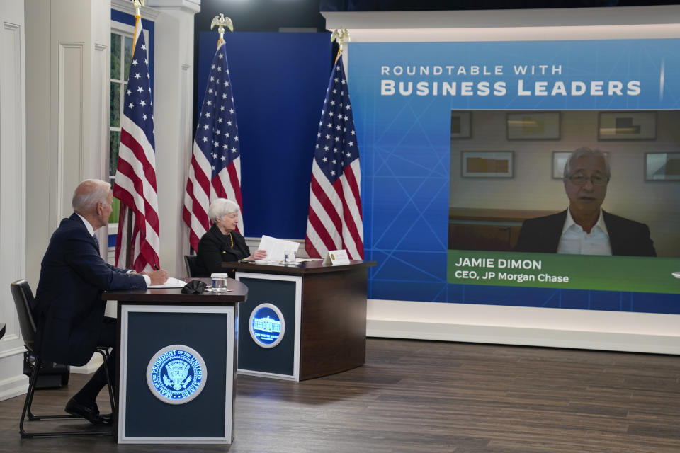 President Joe Biden and Treasury Secretary Janet Yellen listen as Jamie Dimon, CEO of JP Morgan Chase, speaks during a meeting with business leaders about the debt limit in the South Court Auditorium on the White House campus, Wednesday, Oct. 6, 2021, in Washington. (AP Photo/Evan Vucci)