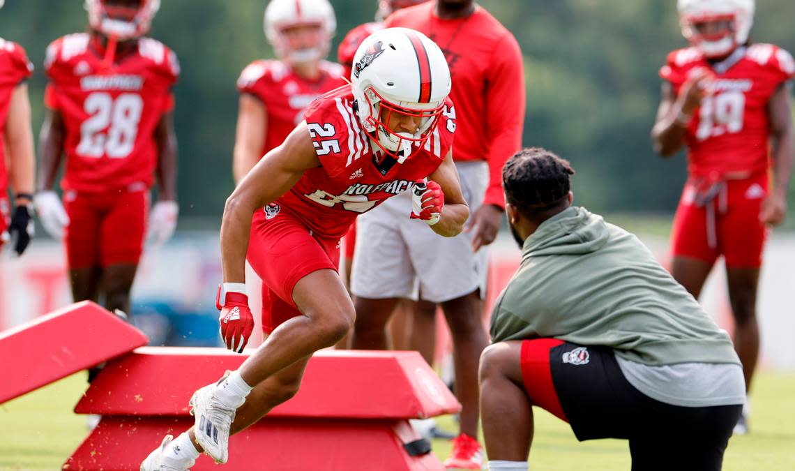 N.C. State cornerback Brandon Cisse (25) runs a drill during the Wolfpack’s first fall practice in Raleigh, N.C., Wednesday, August 2, 2023. Ethan Hyman/ehyman@newsobserver.com