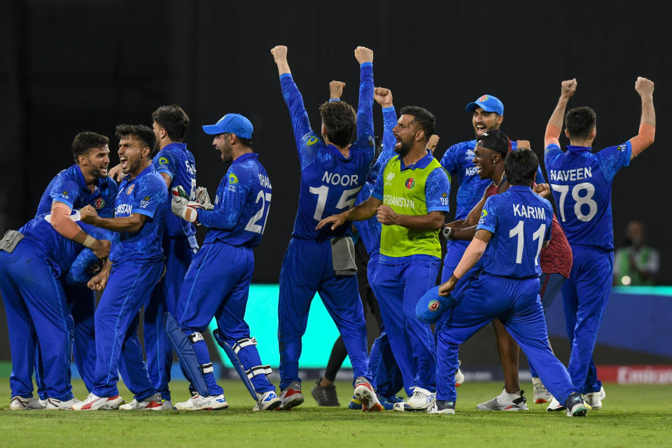 Afghanistan's players celebrate winning their ICC men's Twenty20 World Cup 2024 Super Eight cricket match against Bangladesh at Arnos Vale Stadium in Arnos Vale, Saint Vincent and the Grenadines on June 24, 2024. (Photo by Randy Brooks / AFP) (Photo by RANDY BROOKS/AFP via Getty Images)