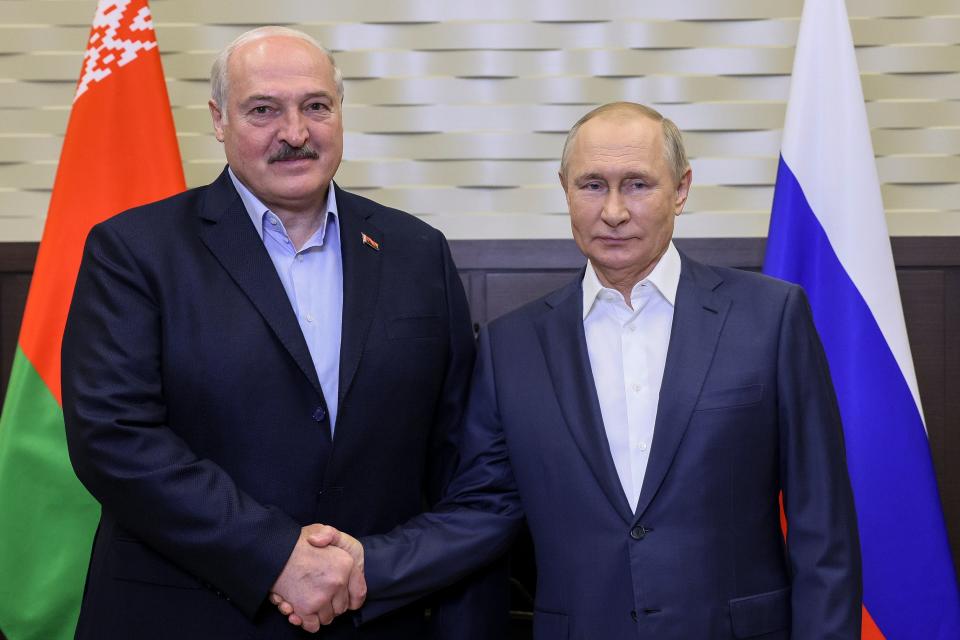 Close allies Alexander Lukashenko and Vladimir Putin (AP)