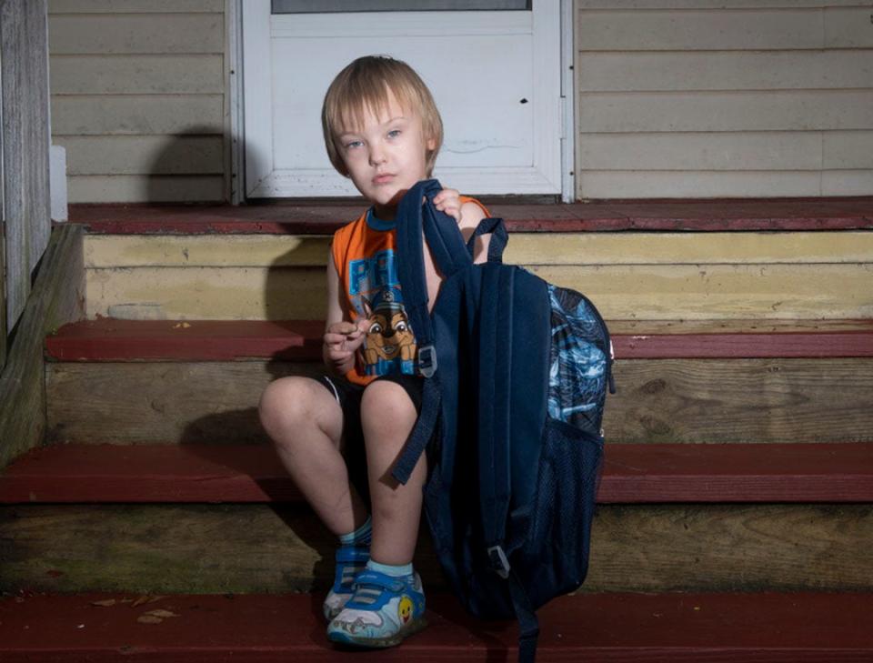 Joey Stone, 5, on the porch of his Ravenna home on Friday, Aug. 25.