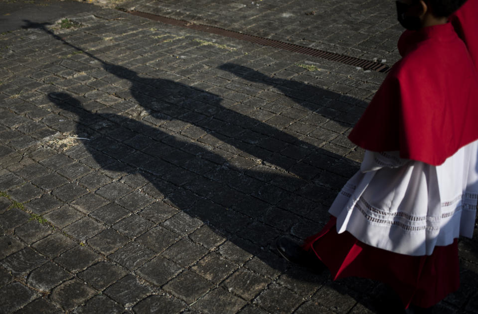 FILE - Catholics take part in a reenactment of the Stations of the Cross during the Lenten season at the Metropolitan Cathedral in Managua, Nicaragua, Friday, March 17, 2023. Amid tensions between the Vatican and the Daniel Ortega government, Catholics staged the devotional commemoration of Jesus Christ's last day on Earth in the gardens of the Cathedral due to the police ban on celebrating religious festivities on the streets. (AP Photo/Inti Ocon, File)