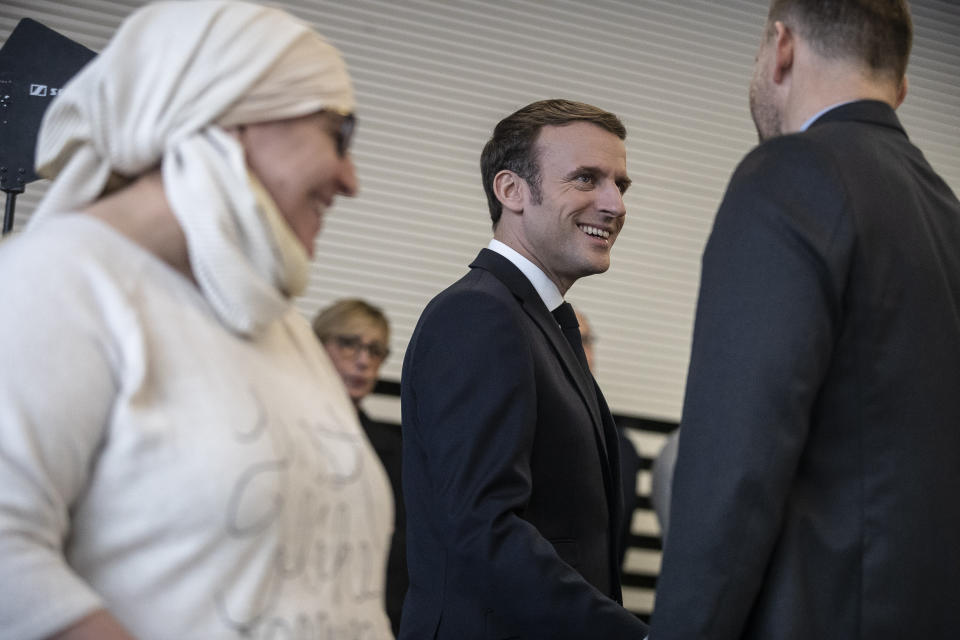 French President Emmanuel Macron, arrives for a meeting with associations, in Mulhouse, eastern France, Tuesday, Feb. 18, 2020. Macron said Tuesday he was determined to fight against "Islamist separatism" but also "discrimination ». (AP Photo/Jean-Francois Badias, Pool)