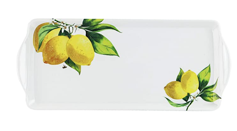 White tray with lemons.