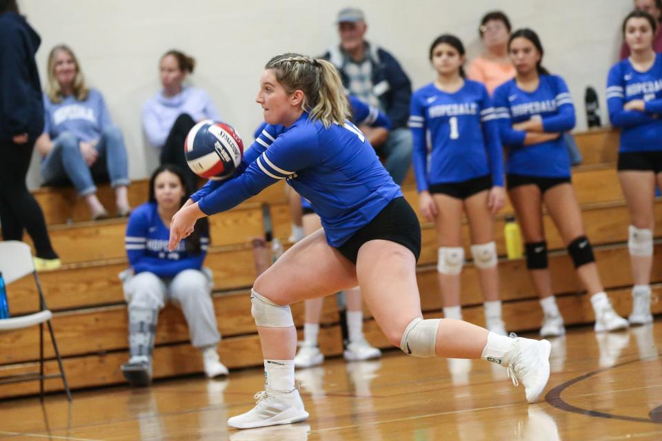 Hopedale’s Kelsey Evans receives a serve during the volleyball game against Ashland at Draper Gym in Hopedale on Oct. 15, 2022.