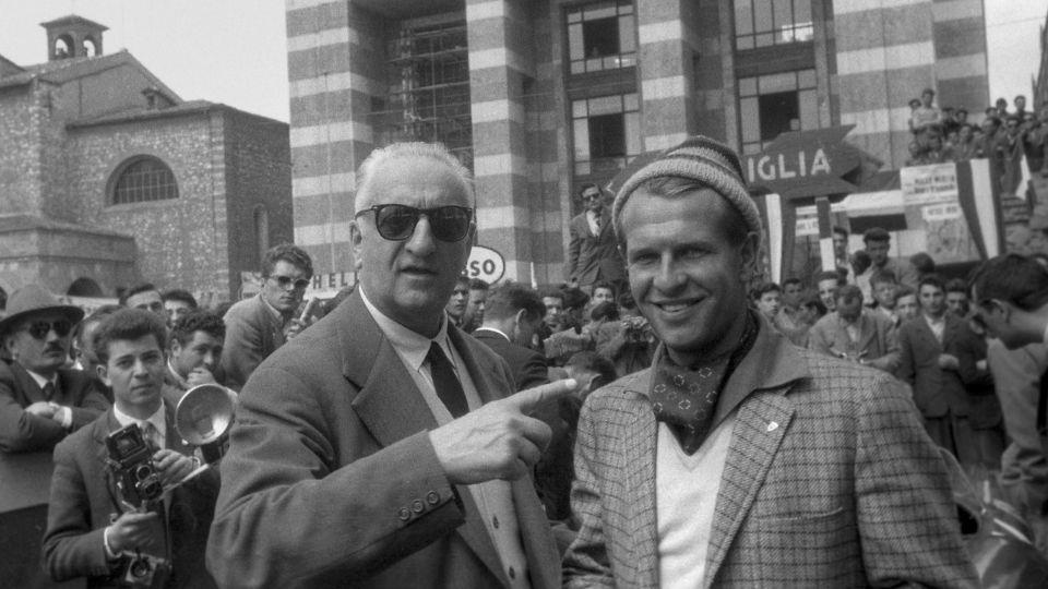 Enzo Ferrari and driver Peter Collins at the start of the 1957 Mille Miglia in Brescia in the Lombardy region of Italy. - Bernard Cahier/Hulton Archive/Getty Images