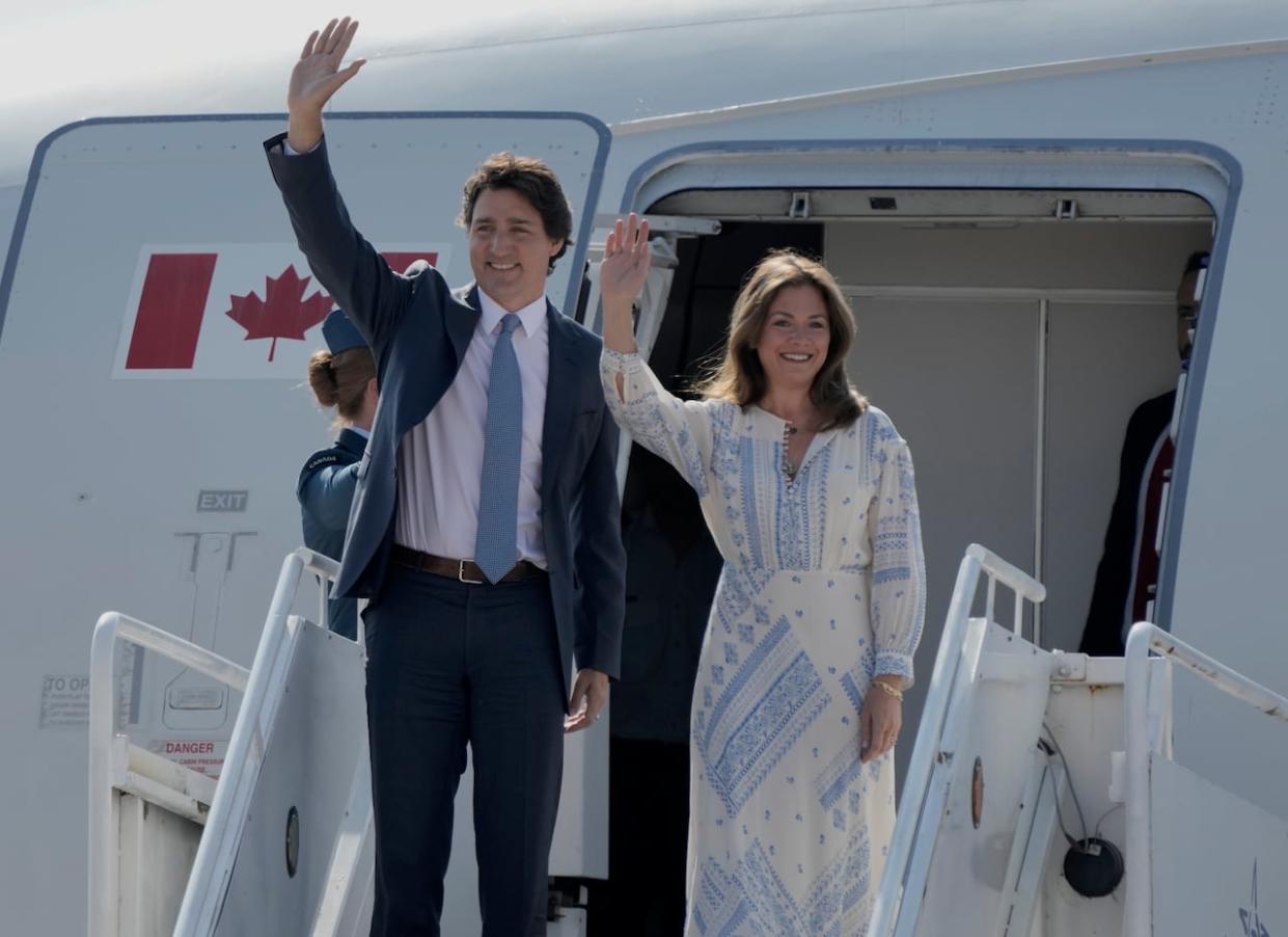 The Prime Minister of Canada Justin Trudeau and his wife Sophie Grégoire Trudeau arrive at the Felipe Angeles international airport in Zumpango, Mexico, on Jan. 9. The two issued statements on Wednesday announcing that they are separating. (Eduardo Verdugo/The Associated Press - image credit)