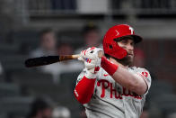 Philadelphia Phillies right fielder Bryce Harper (3) follows through on a double in the eighth inning of a baseball game against the Atlanta Braves, Friday, May 7, 2021, in Atlanta. (AP Photo/John Bazemore)