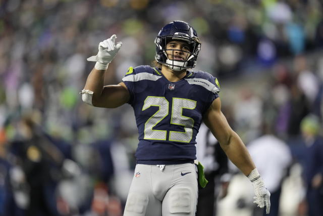 Seahawks place RB Travis Homer on IR, sign CB Xavier Crawford