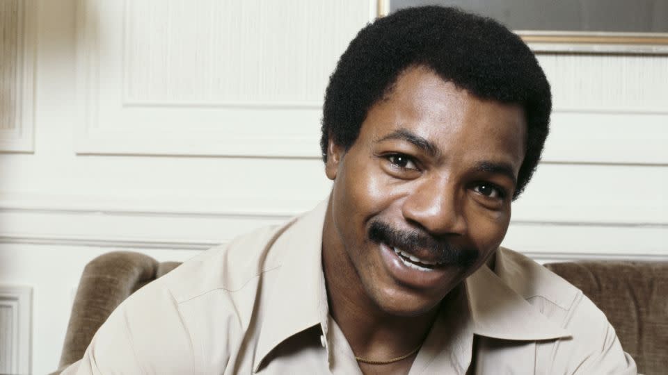 American actor and former professional football player Carl Weathers posing in June 1979. - Michael Putland/Hulton Archive/Getty Images