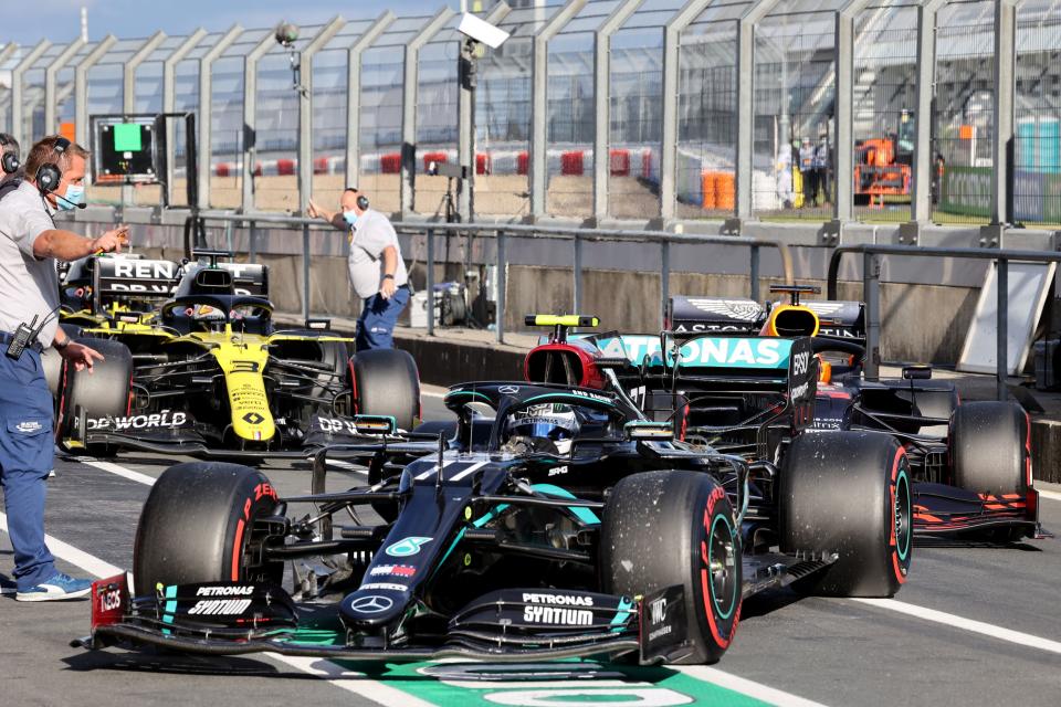 Mercedes' Finnish driver Valtteri Bottas arrives in the pits after winning the pole position after the qualifying session at the Nuerburgring circuit in Nuerburg, western Germany, on October 10, 2020, ahead of the German Formula One Eifel Grand Prix. (Photo by WOLFGANG RATTAY / POOL / AFP) (Photo by WOLFGANG RATTAY/POOL/AFP via Getty Images)