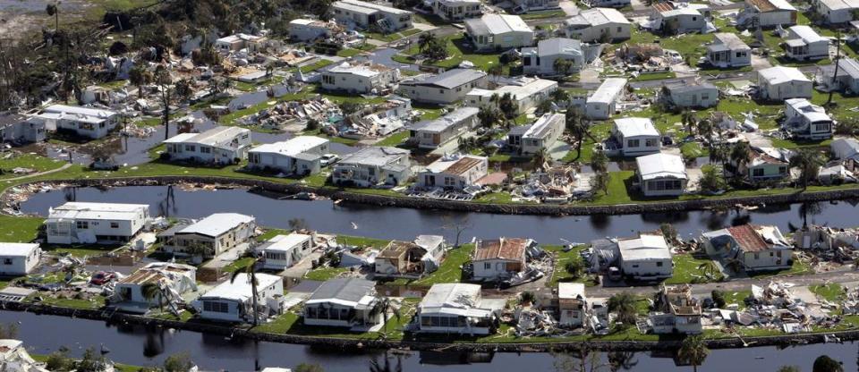 Homes damaged by Hurricane Charley are seen from an aerial view of the outskirts of Punta Gorda, Charlotte County, Florida, Sunday, Aug. 15, 2004.