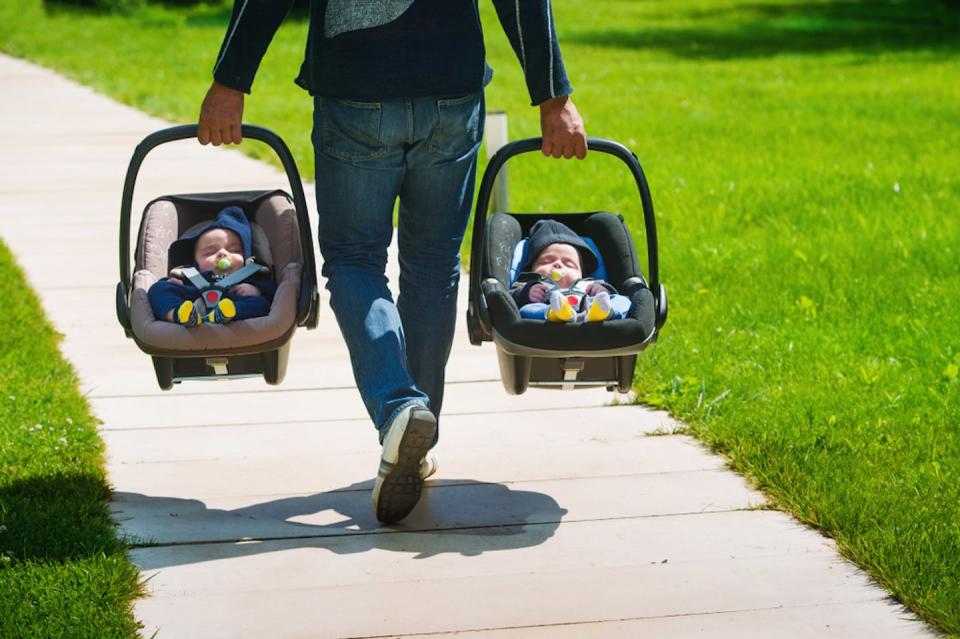 Identical twins are actually quite rare. <a href="https://www.shutterstock.com/image-photo/father-carrying-twin-babies-car-seats-1128705452" rel="nofollow noopener" target="_blank" data-ylk="slk:Shutterstock;elm:context_link;itc:0;sec:content-canvas" class="link ">Shutterstock</a>