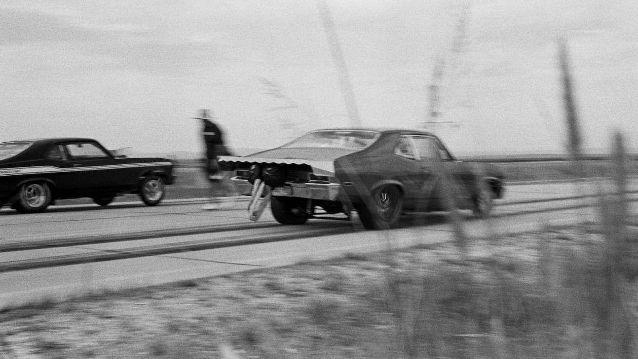 a group of cars on a road