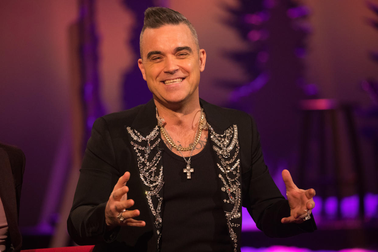 Robbie Williams during the filming for the Graham Norton Show at BBC Studioworks 6 Television Centre, Wood Lane, London, to be aired on BBC One on Friday evening. Picture date: Thursday December 19, 2019. Photo credit should read: PA Images on behalf of So TV