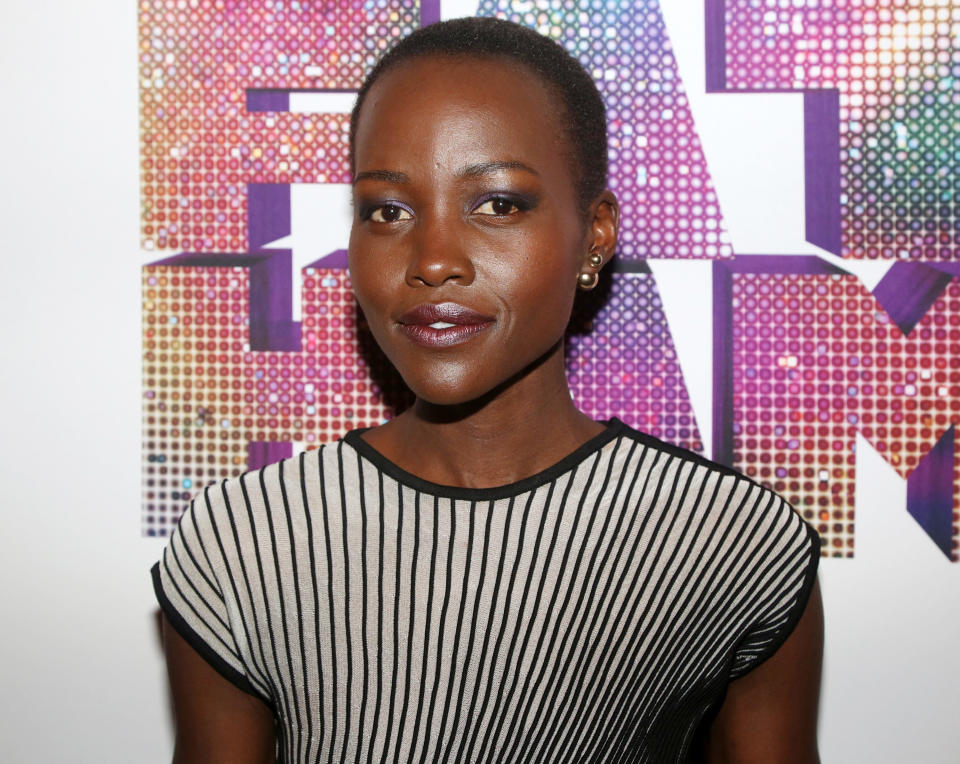 Lupita with a close-cropped do