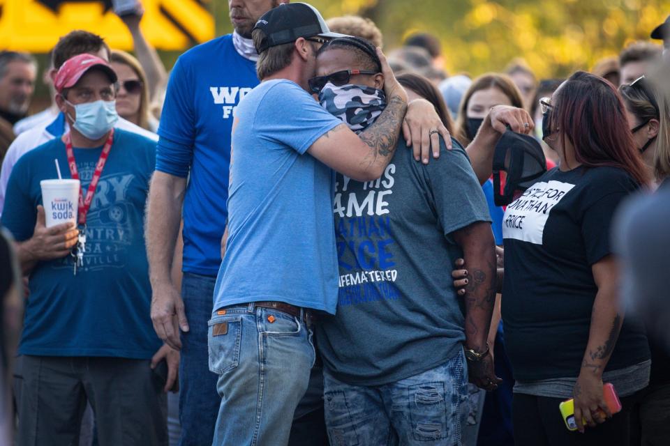 People gather for a march, rally and candle light vigil in honor Jonathan Price (Getty Images)