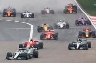 Formula One - F1 - Chinese Grand Prix - Shanghai, China - 09/04/17 - Mercedes driver Lewis Hamilton of Britain leads the race at the start of the Chinese Grand Prix at the Shanghai International Circuit. REUTERS/Aly Song