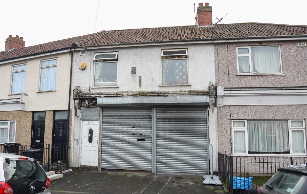 The shuttered-up property in Bristol used to be Speedwell Mini Market. (SWNS)