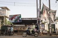 The contest between Nigeria's former military ruler and presidential candidate Muhammadu Buhari was delayed by six weeks due to violence by Boko Haram extremists