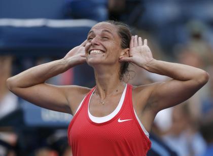 Roberta Vinci celebrates after defeating Serena Williams. (REUTERS)