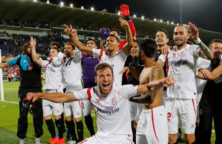 Football - Fiorentina v Sevilla - UEFA Europa League Semi Final Second Leg - Artemio Franchi Stadium, Florence, Italy - 14/5/15 Sevilla players celebrate at the end of the match Reuters / Giampiero Sposito