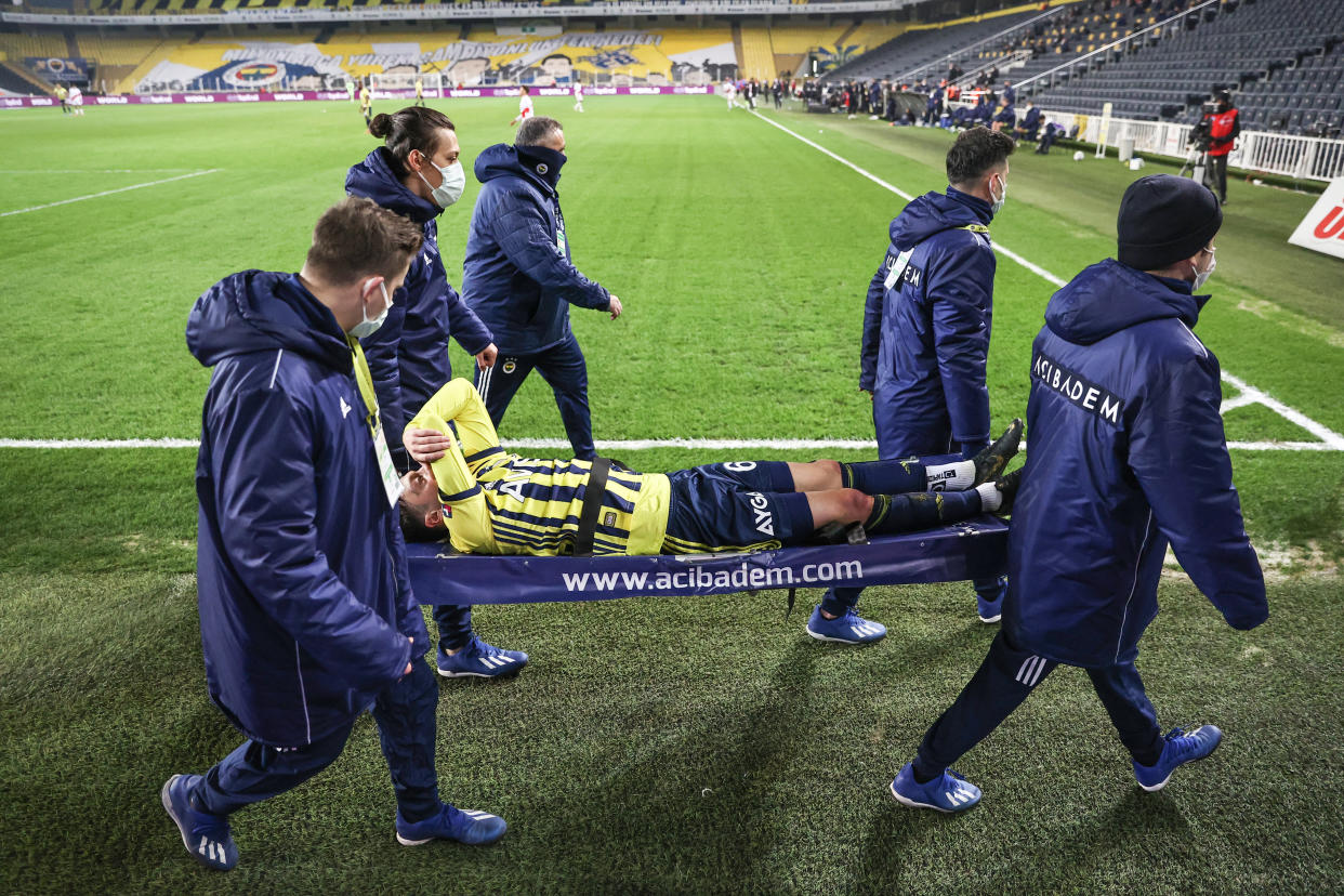 ISTANBUL, TURKEY - MARCH 4: Mesut Ozil of Fenerbahce is carried on a stretcher off the pitch by medics after an injury during the Turkish Super Lig week 28 match between Fenerbahce and Fraport TAV Antalyaspor at Ulker Stadium in Istanbul, Turkey on March 4, 2021. (Photo by Emrah Yorulmaz/Anadolu Agency via Getty Images)