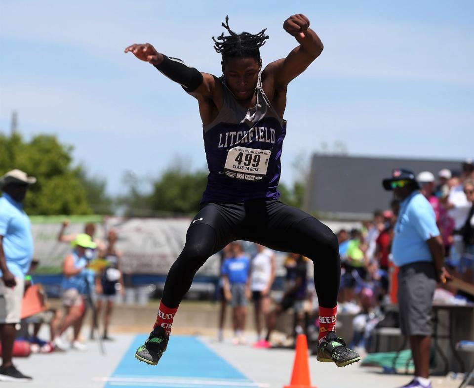 Litchfield's Keenan Powell makes landfall in the Class 1A triple jump during the boys track and field state finals at O'Brien Field in Charleston on Saturday, May 27, 2023.