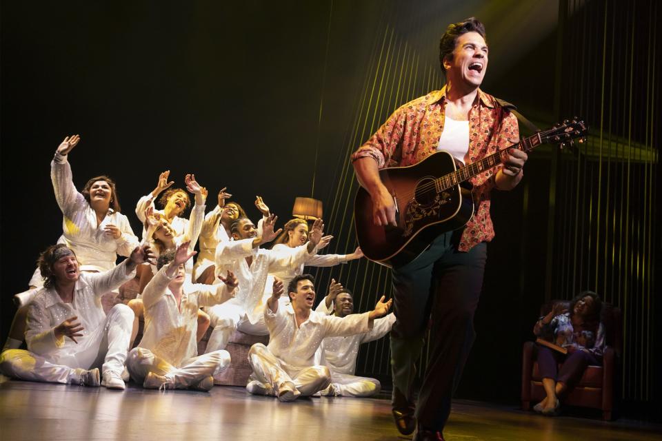 Will Swenson as ‘Neil Diamond – Then,’ Linda Powell as ‘Doctor’ (in background), and The Noise. Photos by Julieta Cervantes