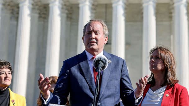 PHOTO: Texas Attorney General Ken Paxton speaks to anti-abortion supporters outside the U.S. Supreme Court following arguments over a challenge to a Texas law that bans abortion after six weeks in Washington, D.C., Nov. 1, 2021. (Evelyn Hockstein/Reuters, FILE)