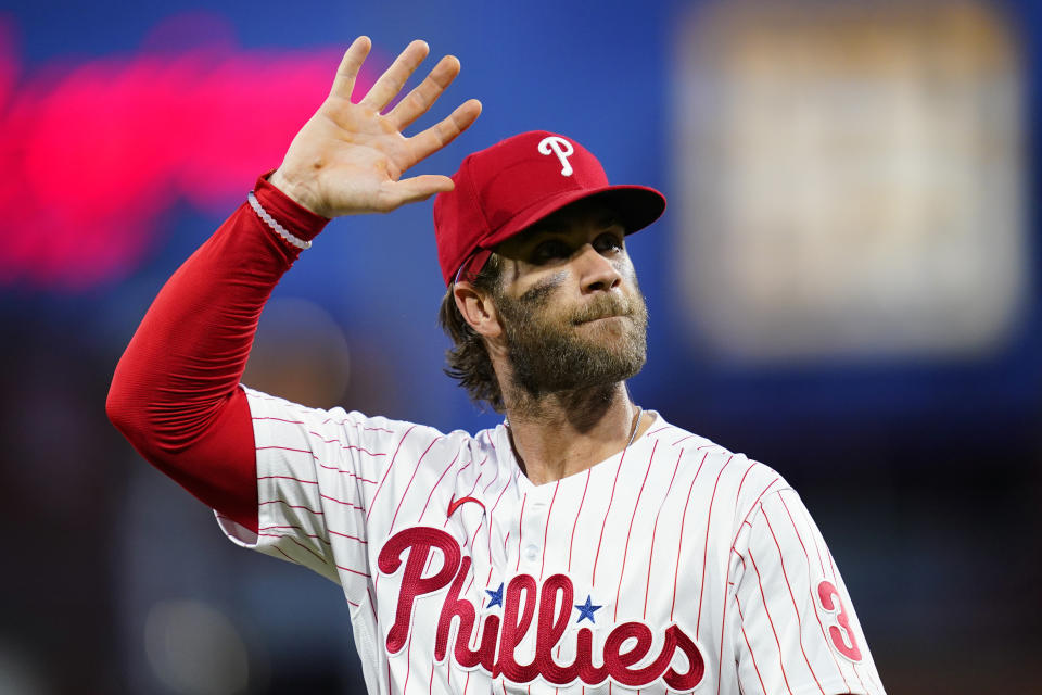 Philadelphia Phillies' Bryce Harper waves to the crowd before an interleague baseball game against the Baltimore Orioles, Wednesday, Sept. 22, 2021, in Philadelphia. (AP Photo/Matt Slocum)