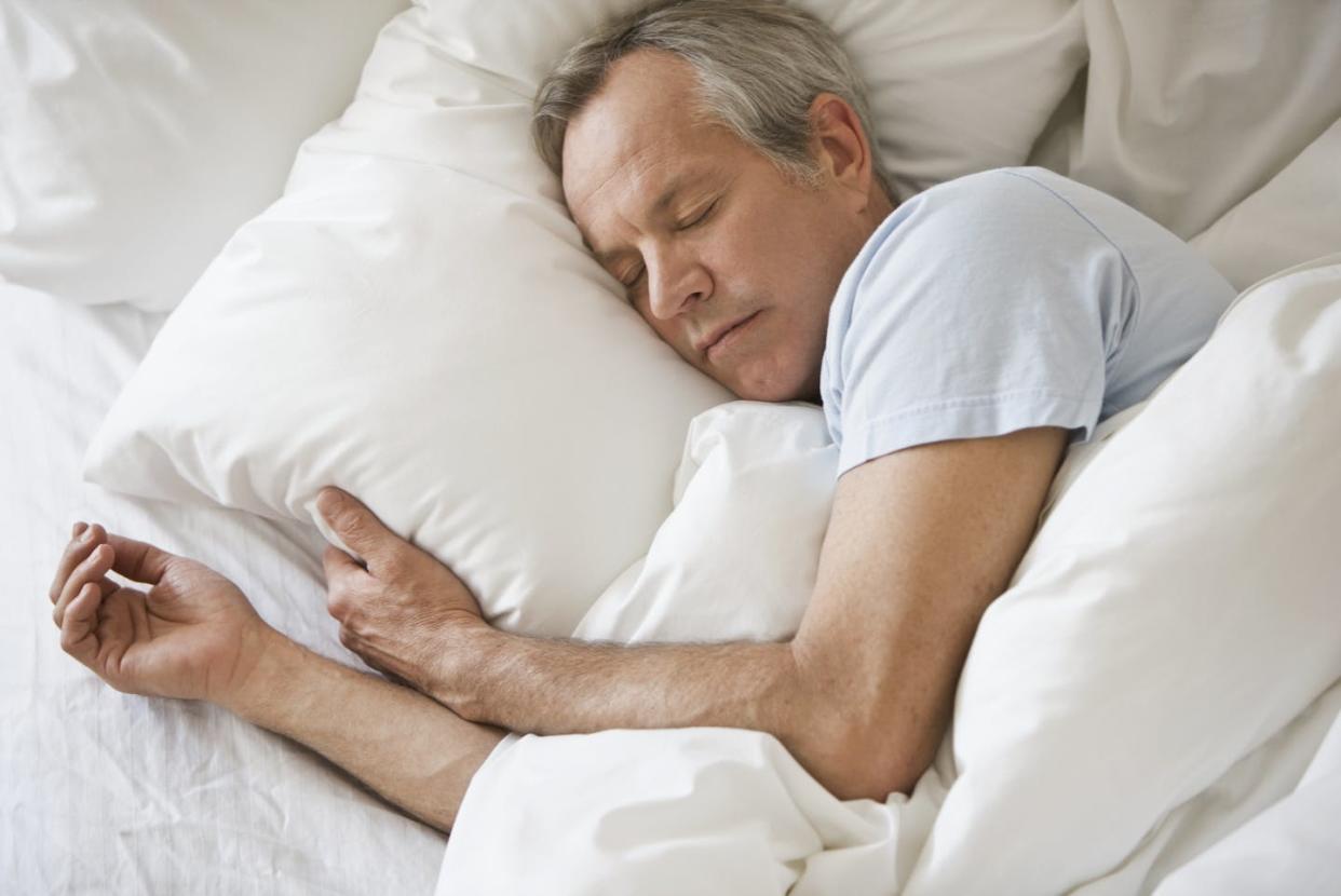 Past age 50, men are much more likely to have REM sleep behavior disorder than women. <a href="https://www.gettyimages.com/detail/photo/caucasian-man-sleeping-royalty-free-image/92305206?phrase=50+year+old+sleeping&adppopup=true" rel="nofollow noopener" target="_blank" data-ylk="slk:Jose Luis Pelaez/Stone via Getty Images;elm:context_link;itc:0;sec:content-canvas" class="link ">Jose Luis Pelaez/Stone via Getty Images</a>