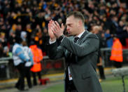 Soccer Football - FA Cup Fourth Round Replay - Tottenham Hotspur vs Newport County - Wembley Stadium, London, Britain - February 7, 2018 Newport County manager Mike Flynn applauds fans after the match REUTERS/Eddie Keogh