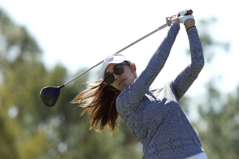 Alison Lee plays her shot from the second tee during the second round of the LPGA CME Group Tour Championship golf tournament, Friday, Nov. 17, 2023, in Naples, Fla. (AP Photo/Lynne Sladky)