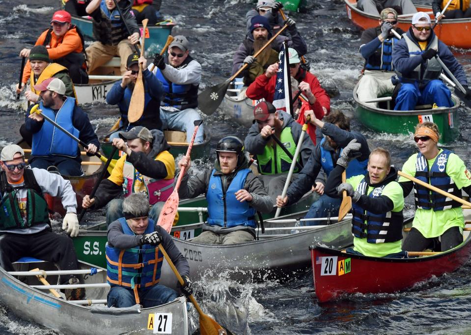 Paddlers compete in the annual River Rat Race in Athol.