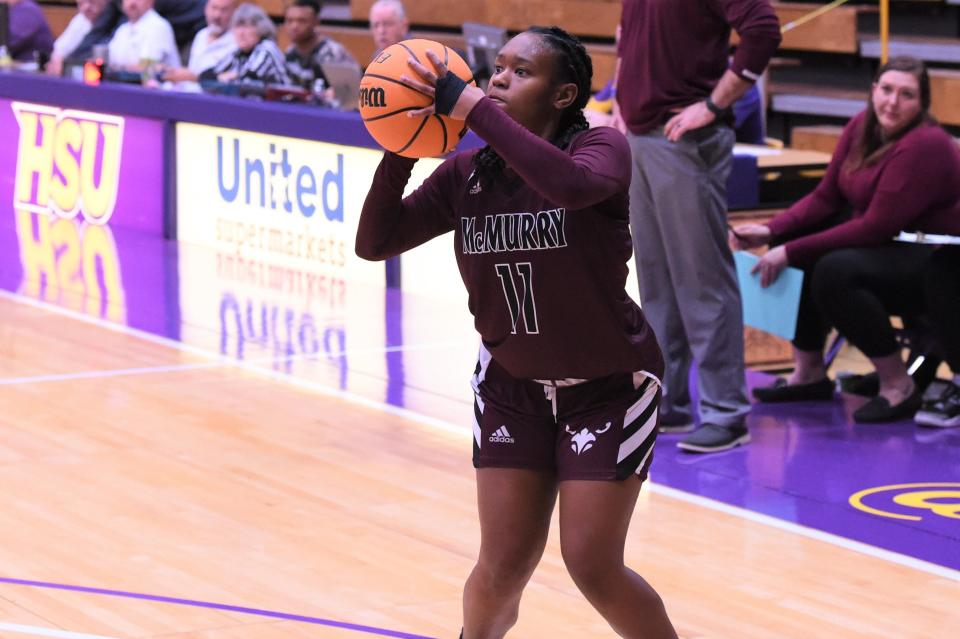 McMurry's D'Asia White (11) lines up a shot during Saturday's ASC game against No. 21 Hardin-Simmons. White scored 14 points as the War Hawks fell 88-69