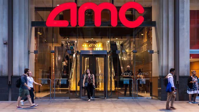 CHICAGO, ILLINOIS - JULY 10, 2018 - Entrance to AMC River East 21 Theaters, sittuated on 322 East Illinois Street during evening hours with people walking.