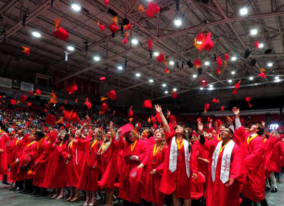 Family and friends fill the Toyota Center in Kennewick on June 11 to watch the 360 Kamiakin High School graduates of the Class of 2022 receive their diplomas and celebrate their achievements. See more photos on page 5A.