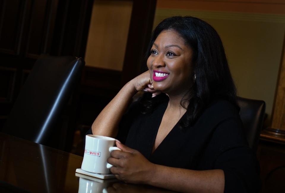 Sen. Sarah Anthony, D-Lansing, smiles during an interview at her office in the state Capitol, Wednesday, March 1, 2023.