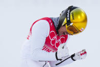 Franz-Josef Rehrl, of Austria, reacts after his jump during the competition round of the individual Gundersen large hill/10km, ski jumping competition at the 2022 Winter Olympics, Tuesday, Feb. 15, 2022, in Zhangjiakou, China. (AP Photo/Matthias Schrader)