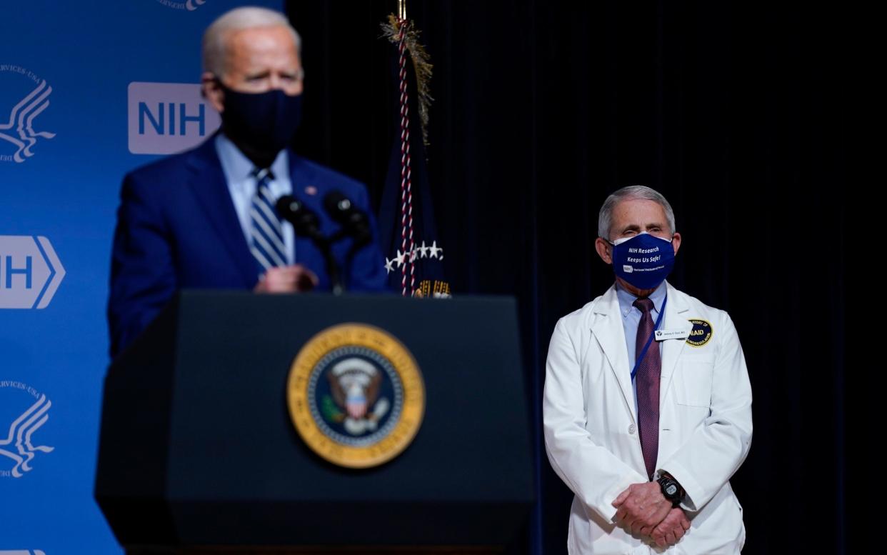 President Joe Biden speaks during a visit to the Viral Pathogenesis Laboratory at the National Institutes of Health in Bethesda MD - AP