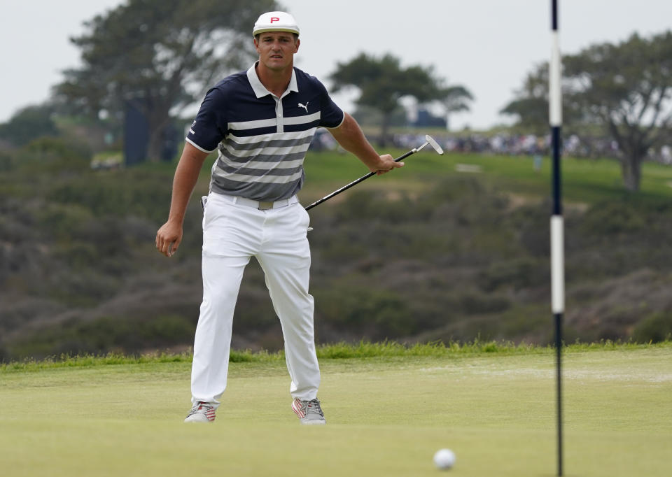 Bryson DeChambeau watches his putt miss the cup on the 13th green during the final round of the U.S. Open Golf Championship, Sunday, June 20, 2021, at Torrey Pines Golf Course in San Diego. (AP Photo/Marcio Jose Sanchez)