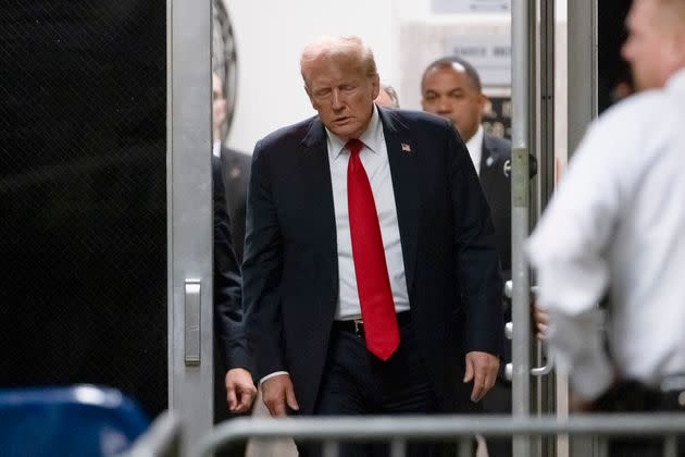 Donald Trump returns from a break as closing arguments wrap up at Manhattan Criminal Court on Tuesday in his trial for allegedly covering up a hush money payment made to an adult film star just days before the 2016 election. 